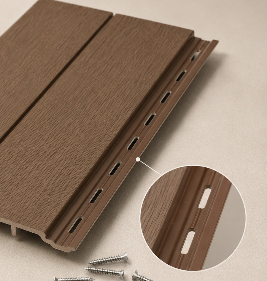 Pre-punched screw slots along the male end of a FlowVeins FV02 cladding panel, with stainless fixings